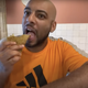 A screenshot of Spanish YouTuber Borja Escalona eating an empanadilla is shown.